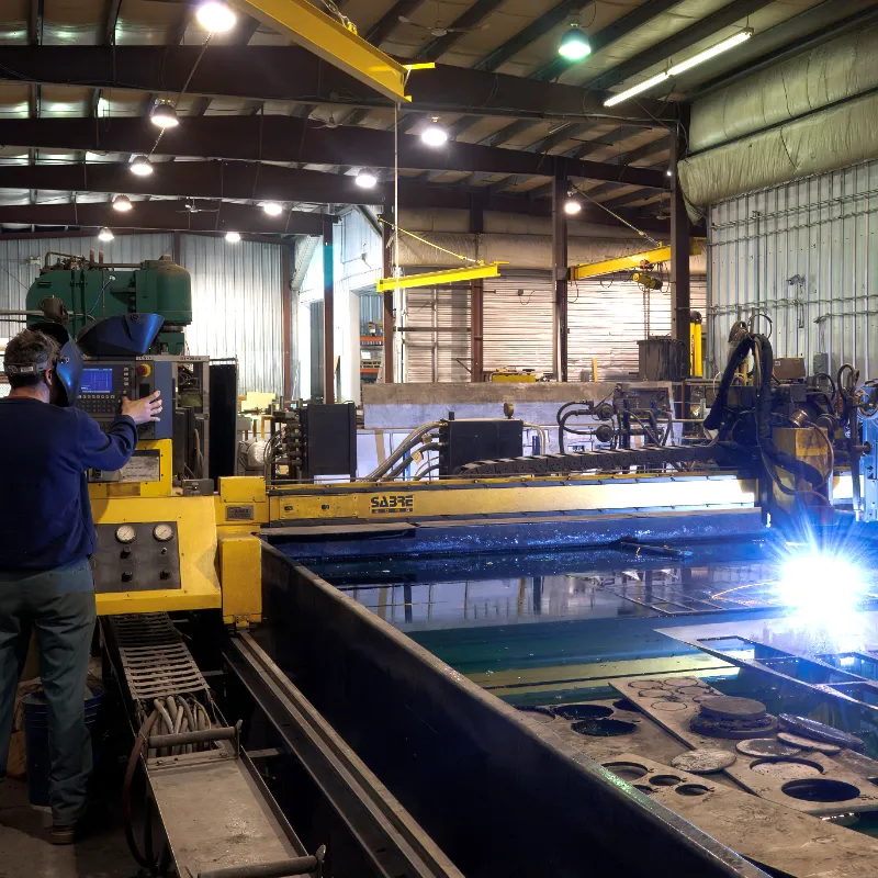 A photo of an Industrial Plasma Cutting laser by Jeff Poissant, RGD.